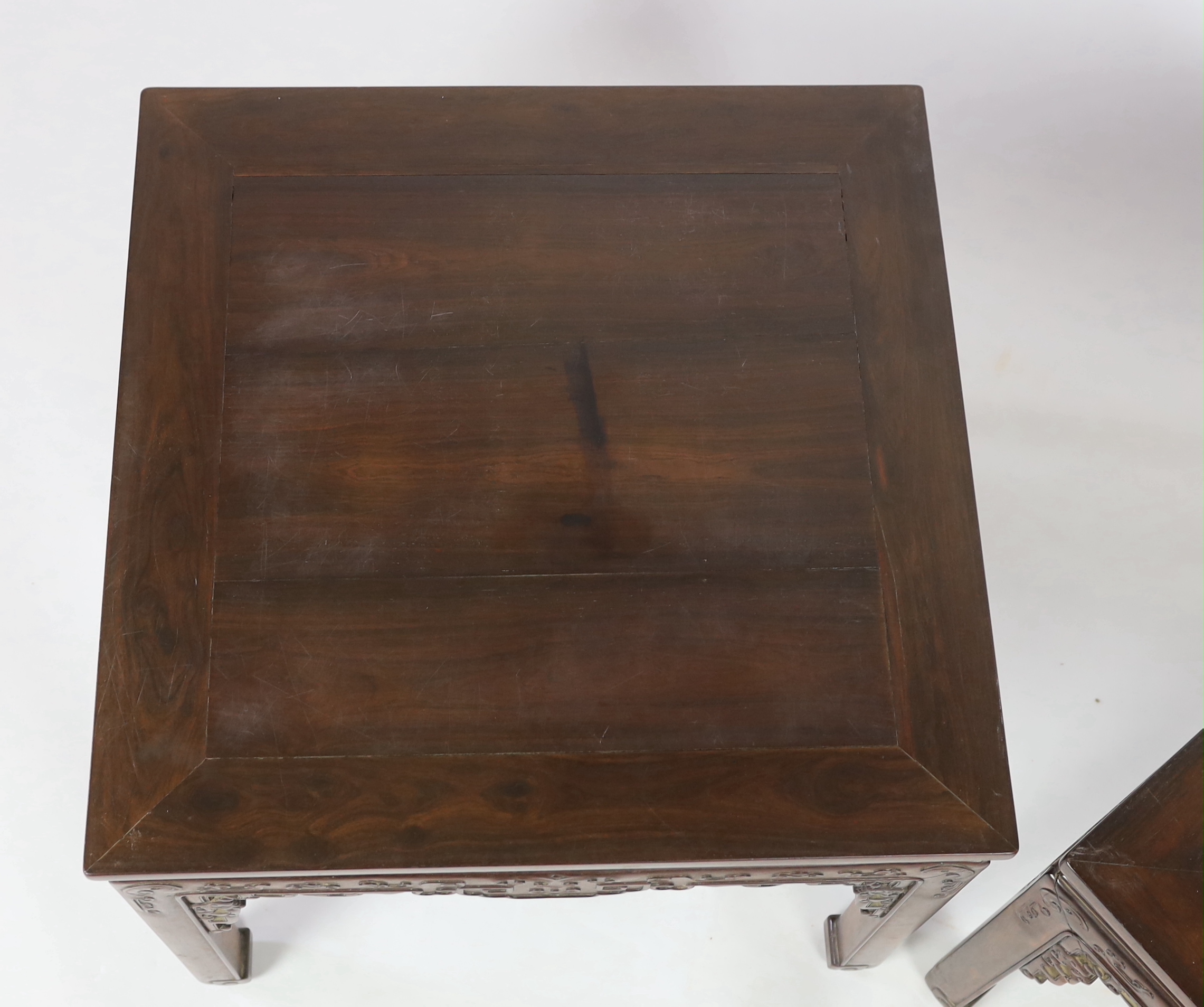 A pair of Chinese huali corner-leg low tables, Qing dynasty, re-polished and restored